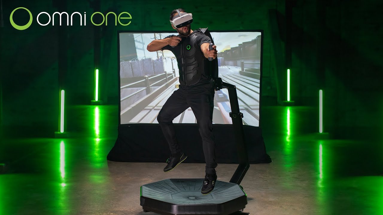 A virtual reality gamer running on an Omni One VR treadmill