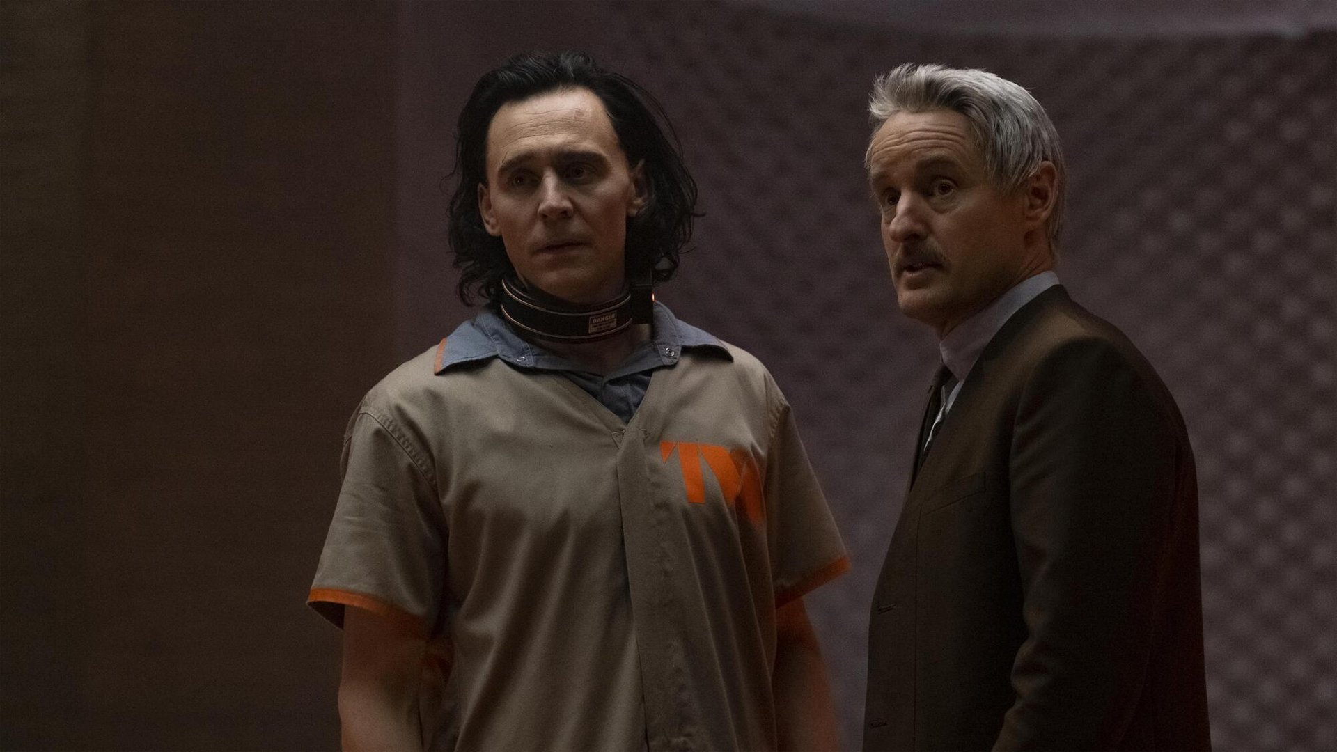 Owen Wilson's Mobius and Tom Hiddleston's Loki look at him.