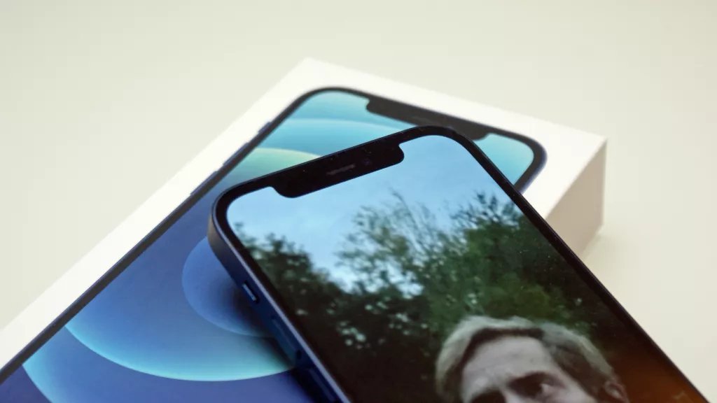 An iPhone 12 with the notch in the center