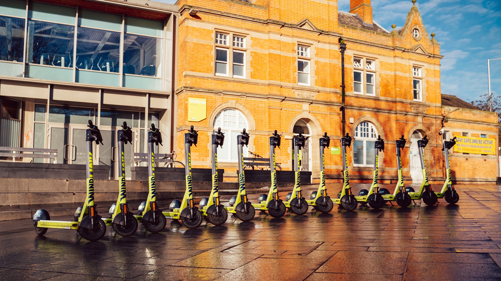 14 Superpedestrian LINK electric scooters lined up