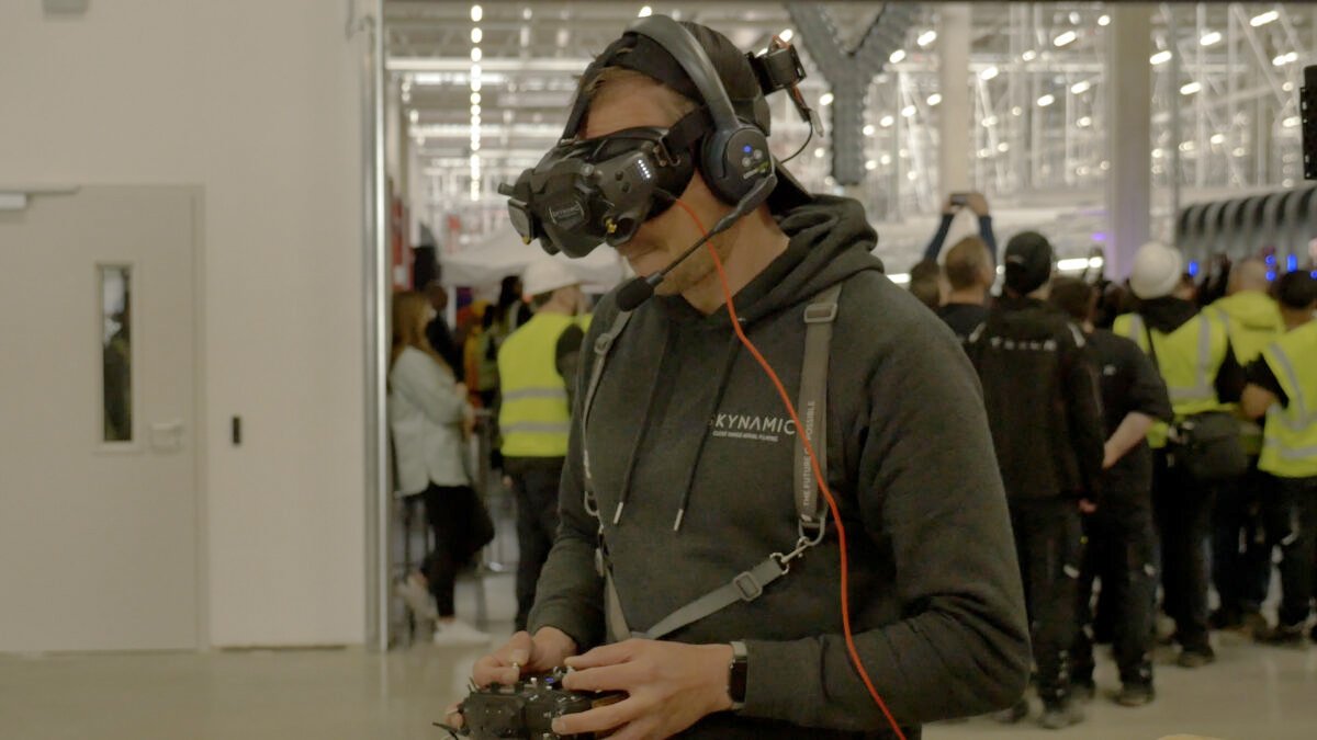 A man with a FPV drone with headset