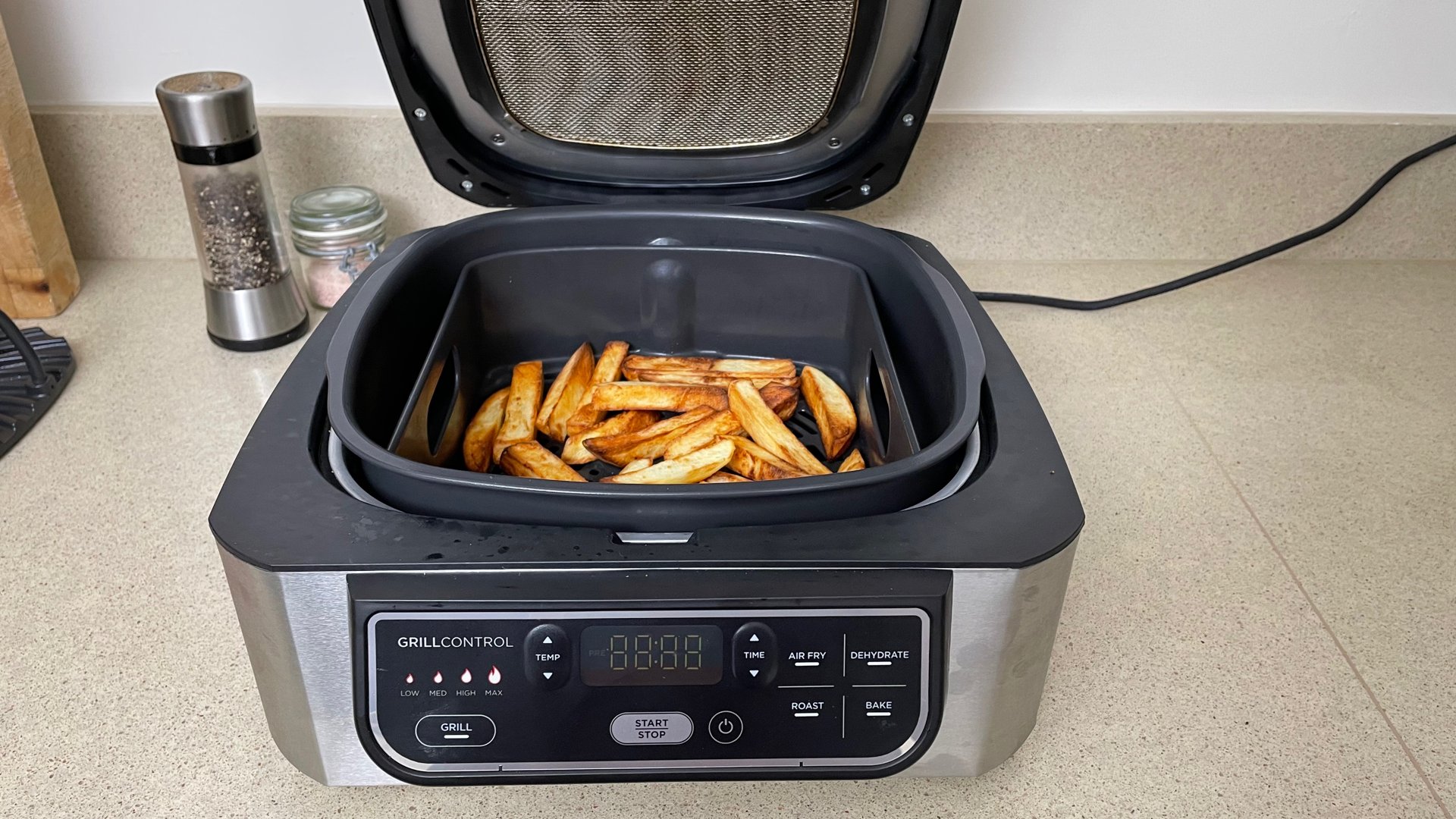 Ninja Foodi Health Grill & Air Fryer with Fries Cooked Inside