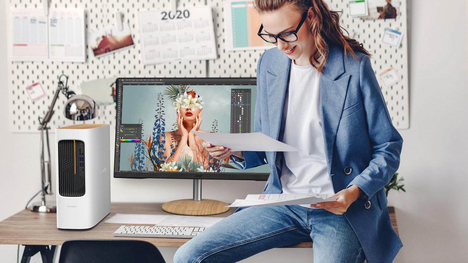 Un'immagine lifestyle di una giovane donna che utilizza un computer desktop Acer ConceptD 100