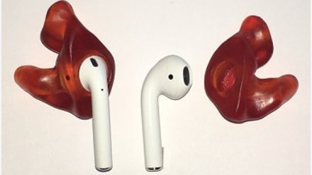 AirPods (1st generation) with red custom Avery tips on white background