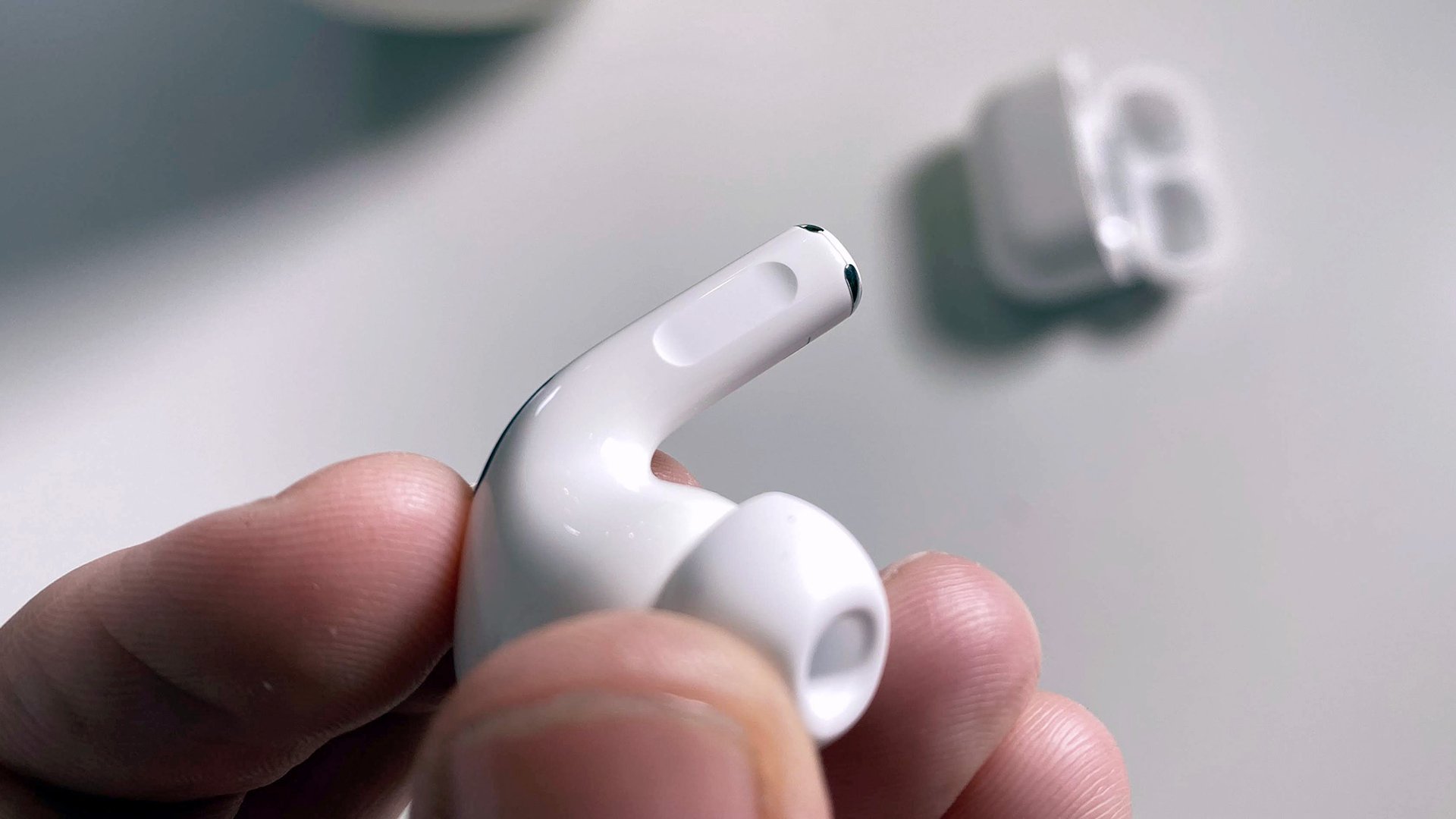 a close up of an AirPods Pro earphone