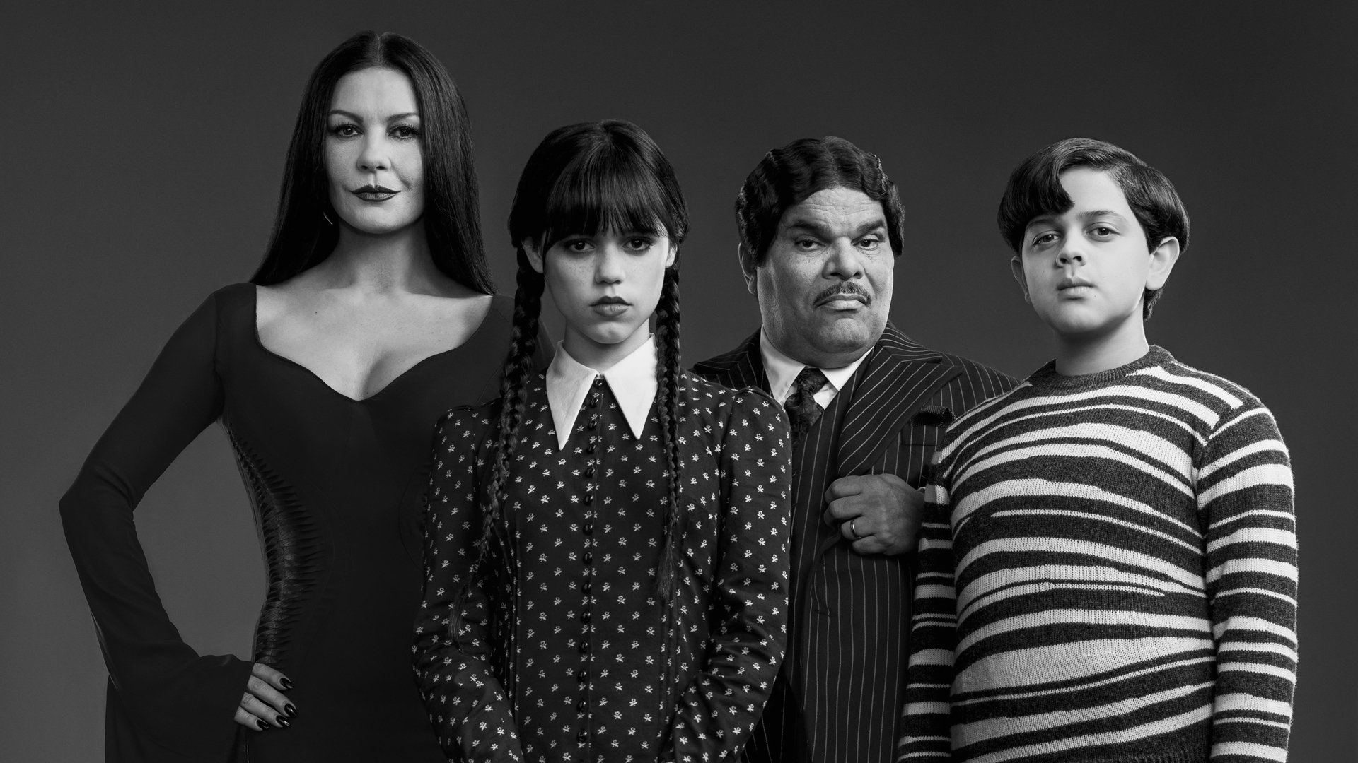 A black and white screenshot of the first image of the Addams Family for Netflix's Wednesday Addams television show.