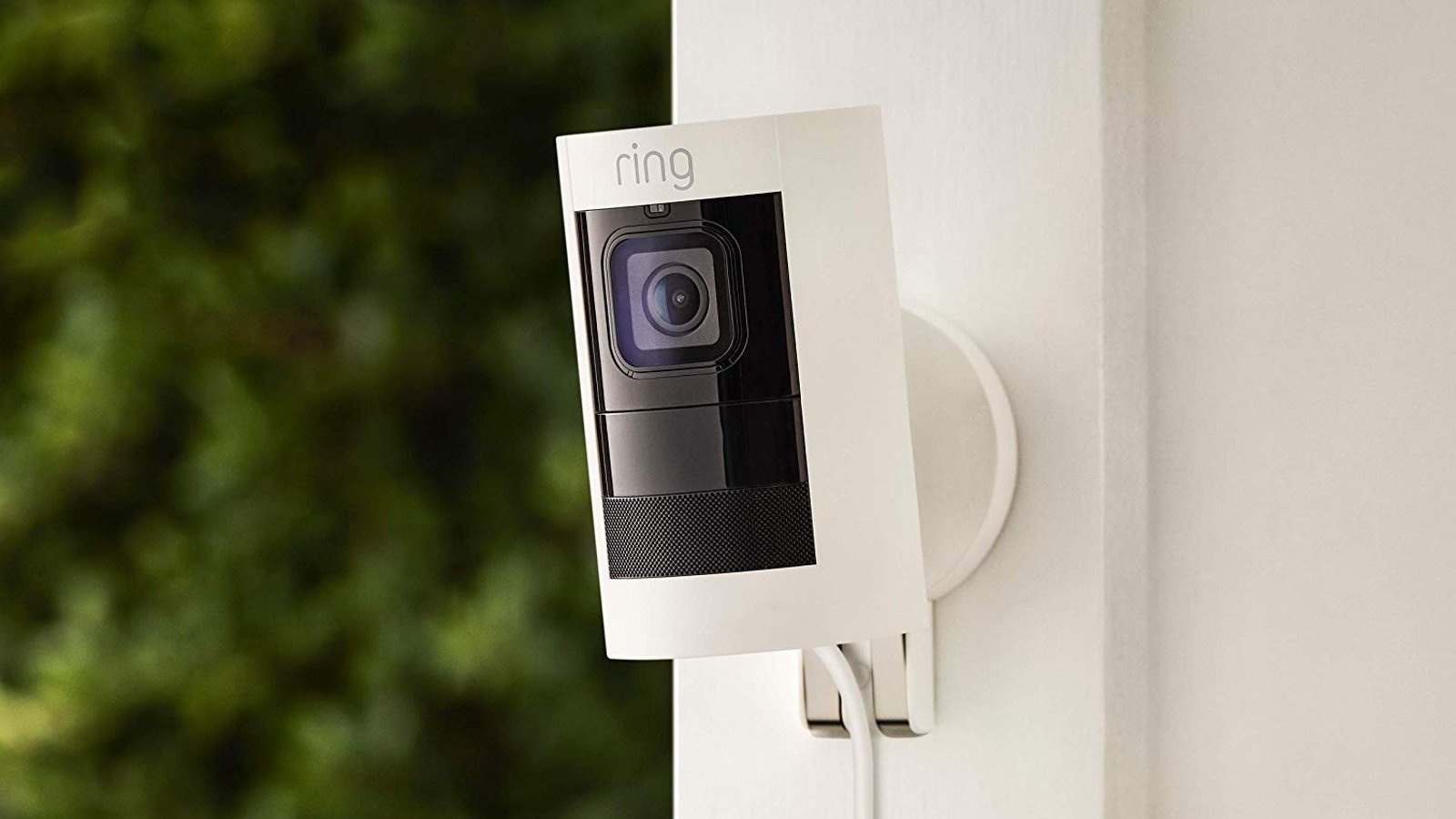 Ring Stick Up Cam mounted on the exterior wall of a house