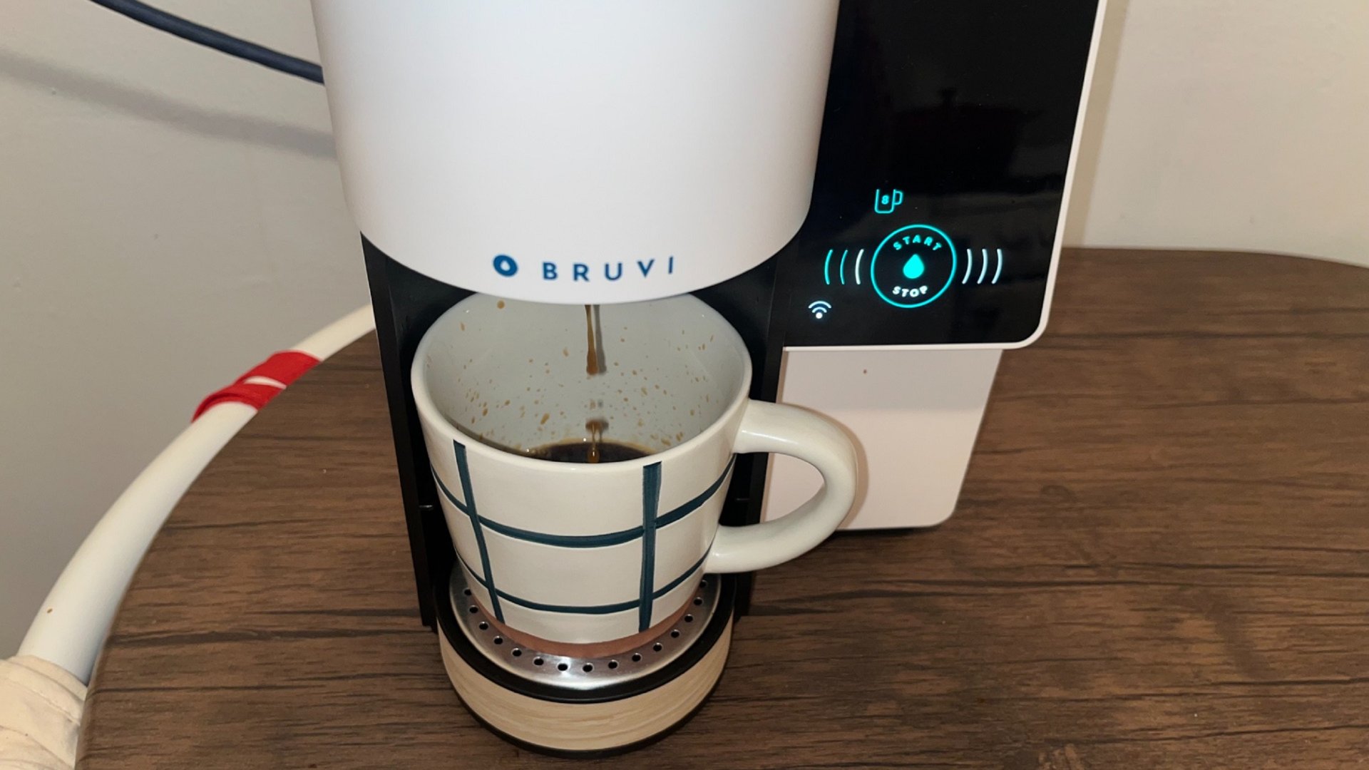 pour into a cup with the bruvi coffee maker
