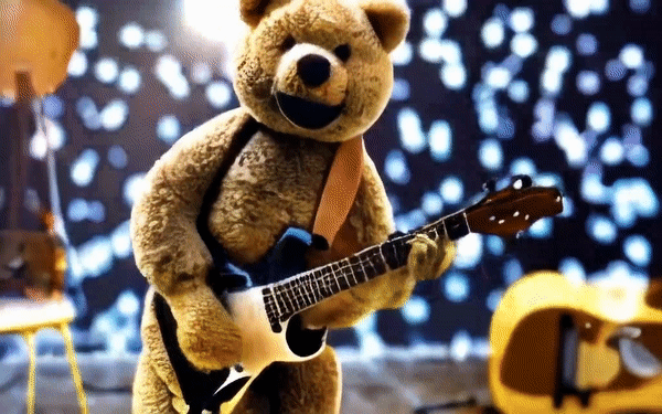 Ein Teddybär, der eine E-Gitarre spielt.
